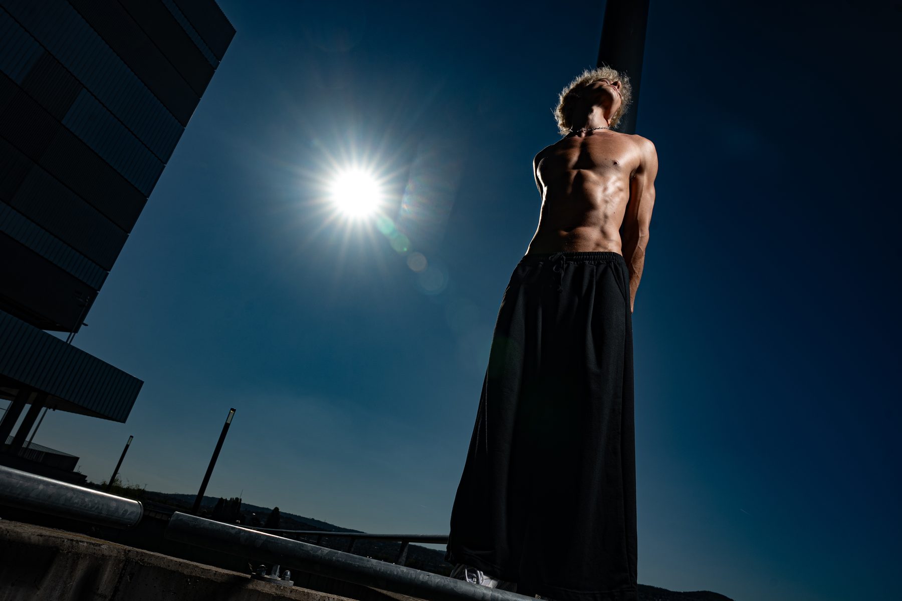 Fitness portrait, silhouette, in sunlight