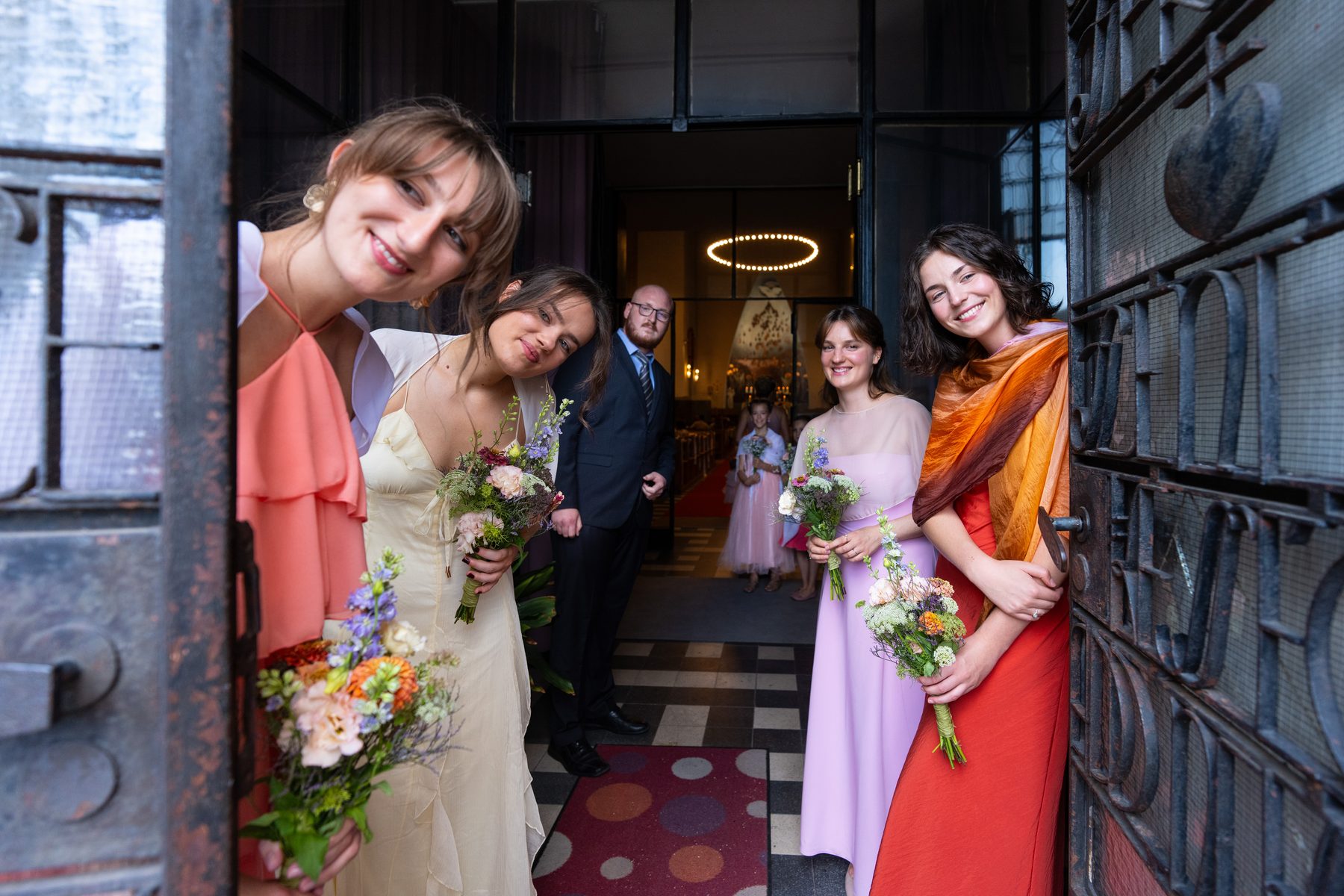 Bridesmaids at the church door