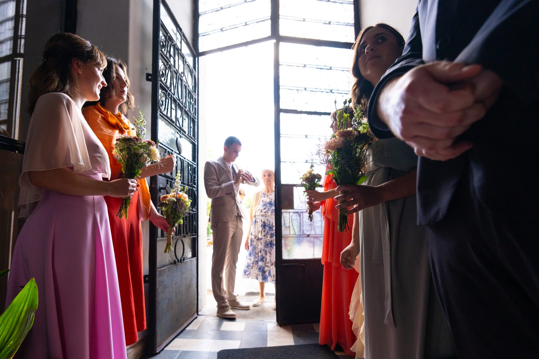 Groom at the entrance, backlit